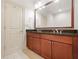 Bathroom features granite countertop and vanity with double sinks at 1199 Lavista Ne Rd, Atlanta, GA 30324