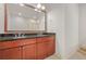 Bathroom features granite countertop and vanity with double sinks at 1199 Lavista Ne Rd, Atlanta, GA 30324