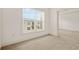 Bedroom with window and neutral carpeting at 1199 Lavista Ne Rd, Atlanta, GA 30324