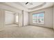 Bedroom with a large window and an open door, offering plenty of light at 1199 Lavista Ne Rd, Atlanta, GA 30324