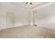 Spacious carpeted bedroom features neutral color scheme with ensuite bathroom and closet at 1199 Lavista Ne Rd, Atlanta, GA 30324