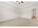 Bright bedroom boasts neutral carpet and walls, complete with fan and ensuite access at 1199 Lavista Ne Rd, Atlanta, GA 30324