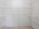 Walk-in closet with white wire shelving, offering ample storage space at 1199 Lavista Ne Rd, Atlanta, GA 30324