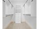 Walk-in closet boasts built-in shelving and storage at 1199 Lavista Ne Rd, Atlanta, GA 30324