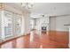Bright open living space with wood floors, French doors, fireplace and updated appliances, for seamless indoor-outdoor living at 1199 Lavista Ne Rd, Atlanta, GA 30324
