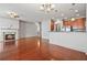 Open-concept living area with wood floors, updated appliances, and abundant natural light, perfect for modern living at 1199 Lavista Ne Rd, Atlanta, GA 30324