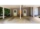 Spacious carport with doors leading to the interior provides sheltered parking and backyard access at 6596 Wright Ne Rd, Atlanta, GA 30328
