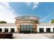 Exterior shot of LA Fitness with visible signage under a partly cloudy sky at 6596 Wright Ne Rd, Atlanta, GA 30328