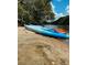 Blue kayak on the sandy riverbank, inviting residents for water activities and outdoor adventures at 6596 Wright Ne Rd, Atlanta, GA 30328