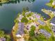 Stunning aerial view of lakefront homes with docks and beautifully landscaped grounds at 705 Berry Ct, Villa Rica, GA 30180