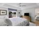 Bedroom with a large window overlooking the water, wood floors, and neutral decor at 705 Berry Ct, Villa Rica, GA 30180