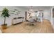 Bright and modern dining room with a beautiful buffet and seating for four, adjacent to the kitchen and living area at 705 Berry Ct, Villa Rica, GA 30180
