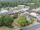 Downtown area with charming shops, outdoor seating, and lush green trees for a vibrant community feel at 9760 Loblolly Ln, Roswell, GA 30075