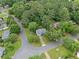 Suburban homes surrounded by lush trees and greenery providing a sense of privacy and tranquility at 9760 Loblolly Ln, Roswell, GA 30075