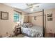 Cozy bedroom with four-poster bed, soft lighting, and serene ambiance at 9760 Loblolly Ln, Roswell, GA 30075