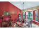 Formal dining room with bay window, pendant light, and elegant decor at 9760 Loblolly Ln, Roswell, GA 30075