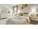 This spacious bedroom boasts neutral tones, large dresser, and a cozy queen bed at 1818 Butterfly Way, Marietta, GA 30066
