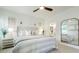 Bright bedroom featuring a neutral palette, and a ceiling fan at 1818 Butterfly Way, Marietta, GA 30066