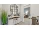 Hallway featuring sideboard with decor and a glimpse into the bedroom at 1818 Butterfly Way, Marietta, GA 30066