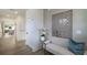 Bright hallway features contemporary decor, wood floors, white trim, and lots of natural light at 1818 Butterfly Way, Marietta, GA 30066