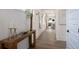 Hallway features contemporary decor, wood floors, white trim, and lots of natural light at 1818 Butterfly Way, Marietta, GA 30066