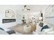 Bright open-concept living space with fireplace, stylish decor, and modern furnishings at 1818 Butterfly Way, Marietta, GA 30066