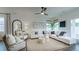 Living room with white furniture, stylish decor, and lots of natural light at 1818 Butterfly Way, Marietta, GA 30066