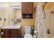Bathroom features a vanity, toilet, shower and bathtub at 3299 Pete Shaw Rd, Marietta, GA 30066