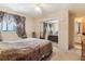 Bedroom with carpet and window with decorative curtains at 3299 Pete Shaw Rd, Marietta, GA 30066
