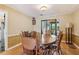 Dining room boasts hardwood floors and ample seating with a classic design at 3299 Pete Shaw Rd, Marietta, GA 30066