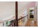Upstairs hallway overlooking living space and a bedroom at 3299 Pete Shaw Rd, Marietta, GA 30066