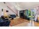 Bright living room featuring hardwood floors, a vaulted ceiling, and a large window at 3299 Pete Shaw Rd, Marietta, GA 30066
