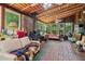 Cozy living room with wood-burning stove, ample windows, and a relaxed atmosphere at 3299 Pete Shaw Rd, Marietta, GA 30066