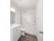 Bathroom featuring a walk-in shower and modern vanity with white cabinets at 3645 Ten Oaks Cir, Powder Springs, GA 30127