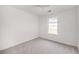 Bedroom with plush carpet and a window bringing in natural light at 3645 Ten Oaks Cir, Powder Springs, GA 30127