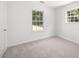 Cozy bedroom with plush carpet and natural light at 3645 Ten Oaks Cir, Powder Springs, GA 30127