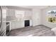 Modern kitchen featuring white cabinets, gray countertops, and stainless steel appliances at 3645 Ten Oaks Cir, Powder Springs, GA 30127