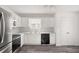 Bright kitchen with stainless steel appliances, white cabinets, and modern countertops at 3645 Ten Oaks Cir, Powder Springs, GA 30127