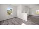 Living room with modern flooring and natural light from multiple windows at 3645 Ten Oaks Cir, Powder Springs, GA 30127