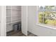 Pantry with ample shelving and a window view at 3645 Ten Oaks Cir, Powder Springs, GA 30127