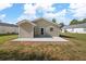 Back exterior view of the property showcasing the patio area at 3645 Ten Oaks Cir, Powder Springs, GA 30127