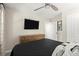 Modern bedroom featuring a ceiling fan and ample storage at 4905 Village Green Dr, Roswell, GA 30075