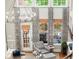 Bright living room with high ceilings, fireplace, and large windows with custom curtains at 4905 Village Green Dr, Roswell, GA 30075
