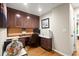 Office space with custom built-ins, desk, and ample storage, perfect for a productive work environment at 4905 Village Green Dr, Roswell, GA 30075