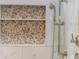 Shower niche featuring mosaic tiles and sleek fixtures at 4905 Village Green Dr, Roswell, GA 30075