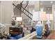 Elegant staircase with carpet runner, wooden steps and decorative railings at 4905 Village Green Dr, Roswell, GA 30075
