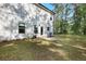 Spacious backyard with a patio and well-maintained lawn, perfect for outdoor entertaining at 115 Haven Brook Way, Douglasville, GA 30134