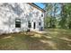 Backyard featuring a well-maintained lawn with a concrete patio at 115 Haven Brook Way, Douglasville, GA 30134