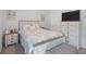 Cozy bedroom with neutral tones, a comfortable bed, and stylish furniture at 115 Haven Brook Way, Douglasville, GA 30134