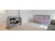 Bedroom equipped with changing station and crib, designed with functional storage options for all baby essentials at 115 Haven Brook Way, Douglasville, GA 30134